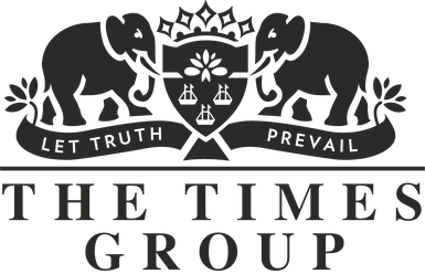 The Times Group logo: two elephants facing inward with a shield crest and crown, banners reading 'Let Truth Prevail', and the 'THE TIMES GROUP' wordmark below.